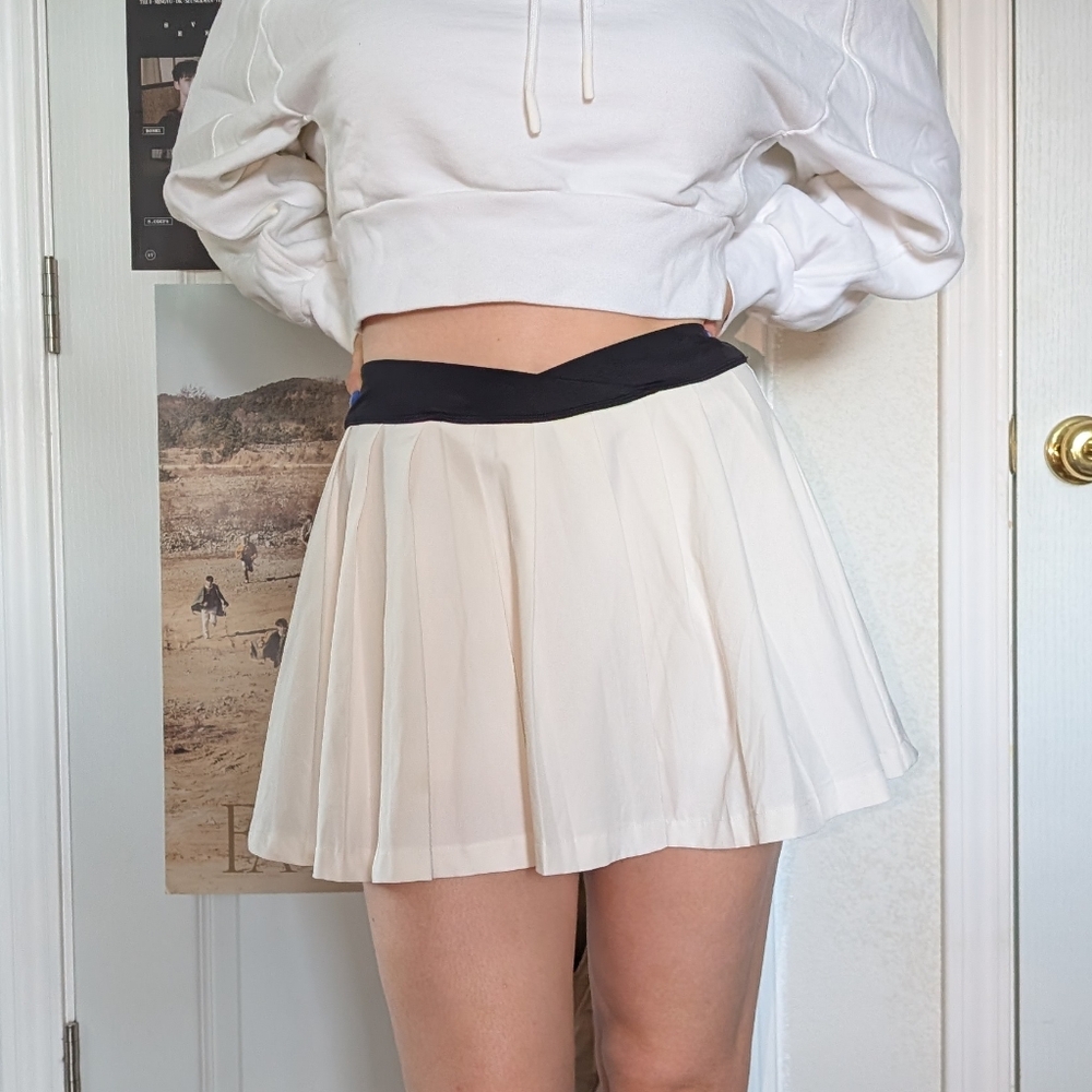 PacSun Cream Tennis Skirt With Black V Band and attached Shorts